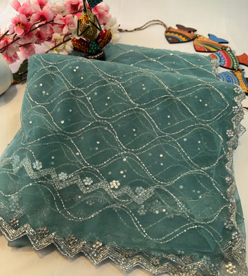 Sequin Bloom Net Saree with floral work and silver scalloped border