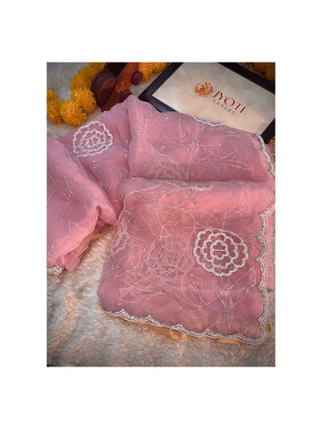 Glass tissue saree with floral embroidery in cutdana and pearl work, scalloped border, and unstitched blouse piece β by Jyoti Sarees