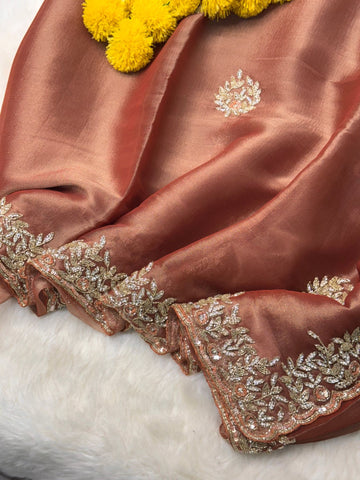 Indian Lady Tissue saree with heavy cutdana handwork, sequin floral motifs, and scalloped embroidered border