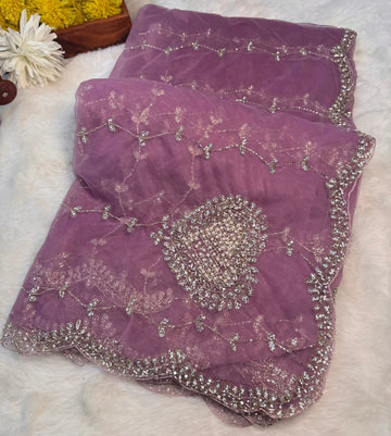 Net saree with full jaal embroidery, pearl and stone work โ available in yellow, rani pink, red, peach, and lavender. Matching blouse included