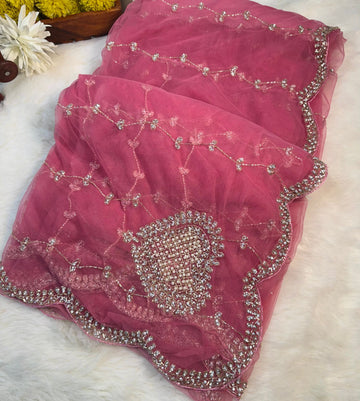 Net saree with full jaal embroidery, pearl and stone work โ available in yellow, rani pink, red, peach, and lavender. Matching blouse included