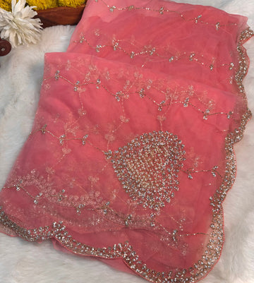Net saree with full jaal embroidery, pearl and stone work โ available in yellow, rani pink, red, peach, and lavender. Matching blouse included