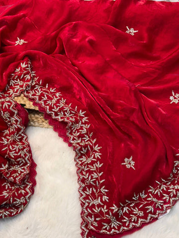 Fendy silk saree with stone floral embroidery and scalloped border in wine and rani pink color