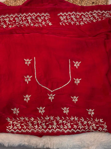 Fendy silk saree with stone floral embroidery and scalloped border in wine and rani pink color