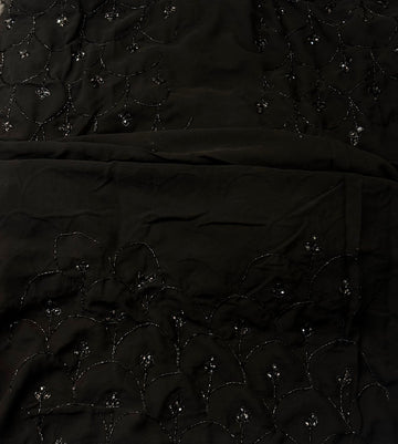 Black georgette saree with floral hand embroidery in cutdana and beads with scalloped border – Jyoti Sarees