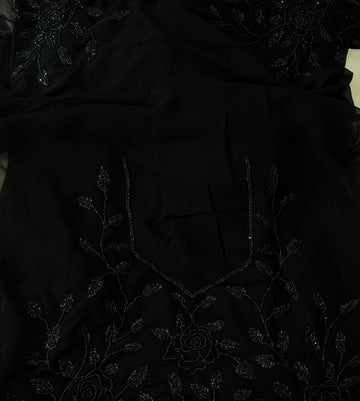 Black georgette saree with cutdana embroidered border β Jyoti Sarees