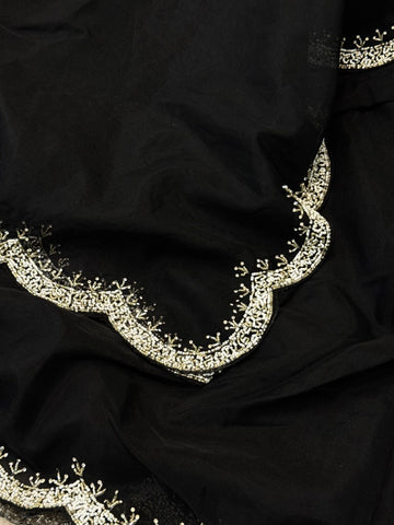 Organza saree featuring delicate scalloped pearl beadwork border with matching unstitched heavy blouse embellished in intricate pearl detailing – ideal for festive and wedding wear.