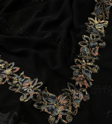 Applique floral work with cutdana highlights