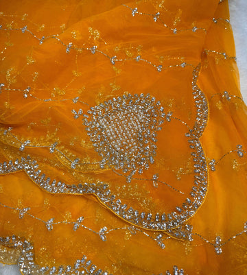 Net saree with full jaal embroidery, pearl and stone work โ available in yellow, rani pink, red, peach, and lavender. Matching blouse included