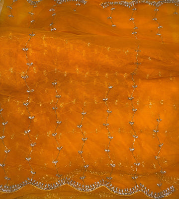 Net saree with full jaal embroidery, pearl and stone work โ available in yellow, rani pink, red, peach, and lavender. Matching blouse included