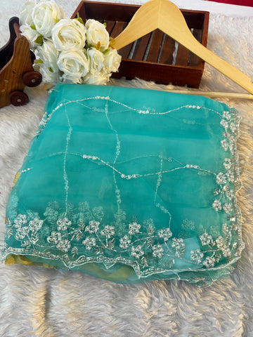 Turquoise blue Crystal tissue saree with white pearl and cutdana handwork β lightweight partywear saree by Jyoti Sarees