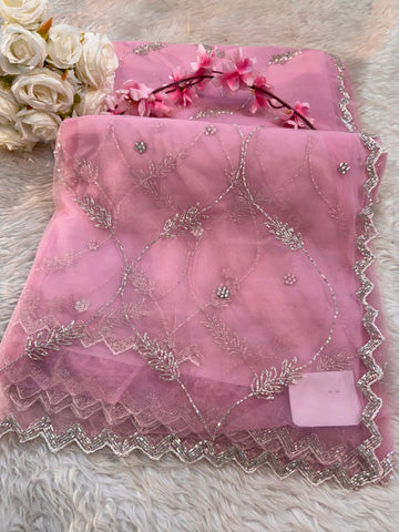 Net saree with floral sequin embroidery, leaf vine motifs, and zigzag border work – includes unstitched blouse