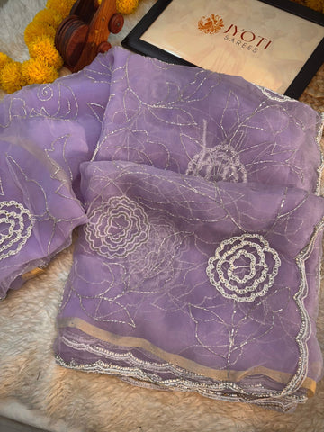 Glass tissue saree with floral embroidery in cutdana and pearl work, scalloped border, and unstitched blouse piece – by Jyoti Sarees