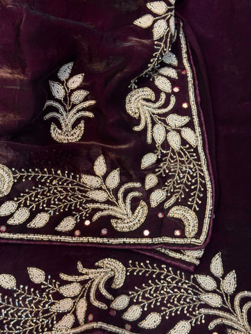Fendy silk saree in wine color with white pearl and bead embroidery in floral and paisley design