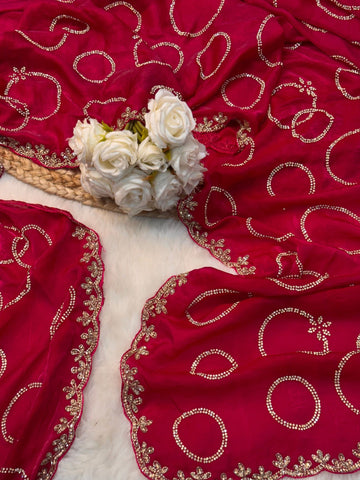 Fendy saree with round gota-style motifs and heavy embroidered floral border


