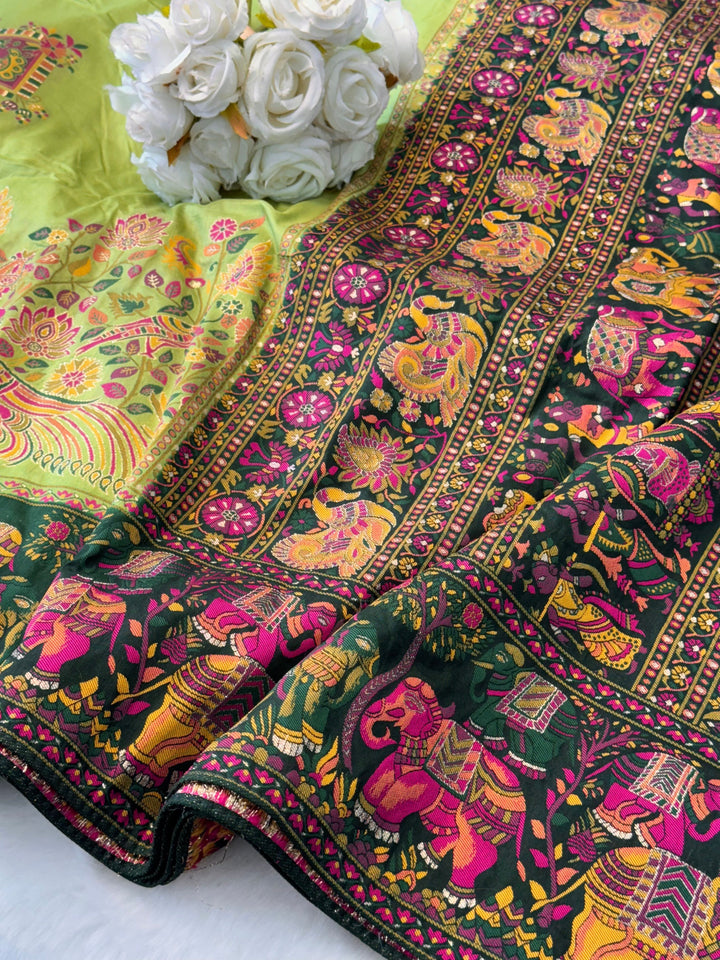 Dola Silk Saree with Vibrant Multicolor Pallu & Elephant Peacock Motif Border