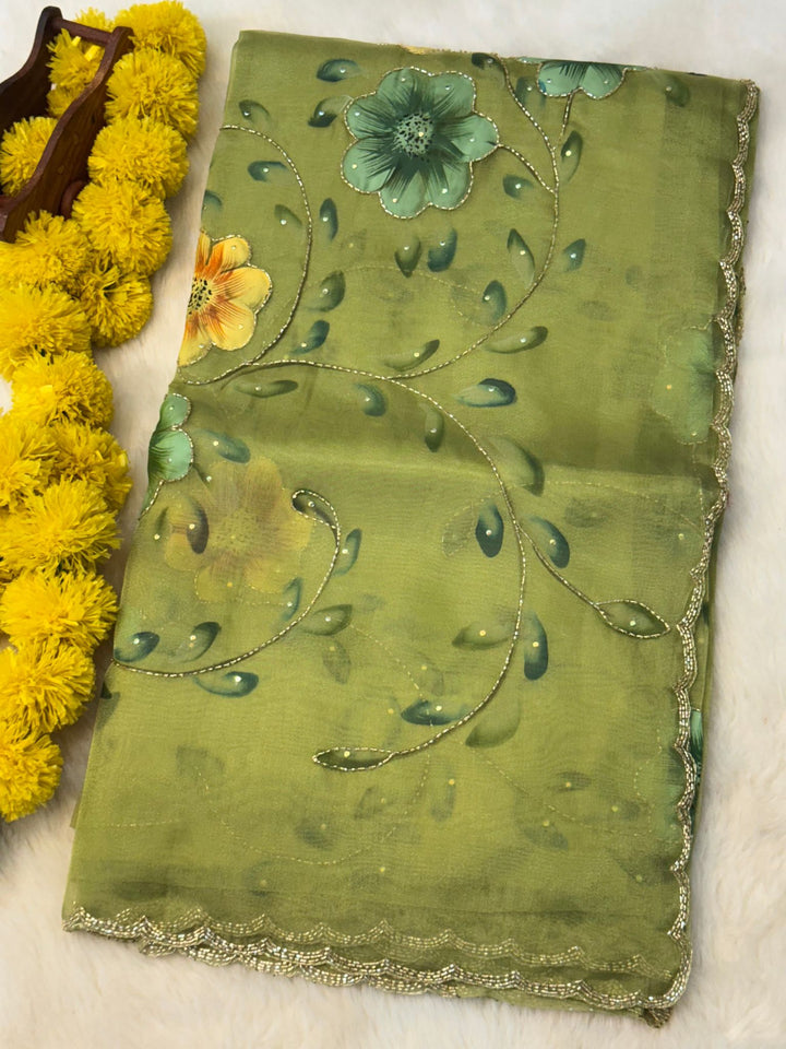 Hand-Painted Floral Organza Saree with Delicate Zari Edging