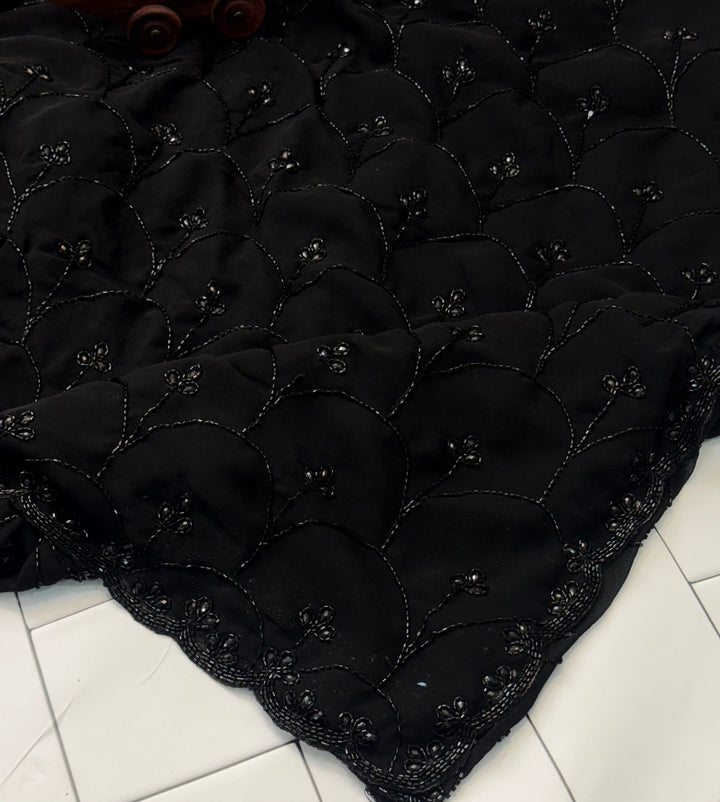 Black georgette saree with floral hand embroidery in cutdana and beads with scalloped border – Jyoti Sarees

