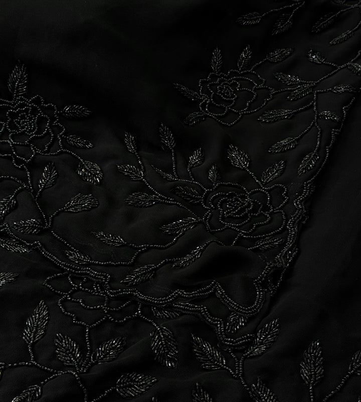 Black georgette saree with cutdana embroidered border – Jyoti Sarees