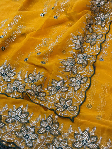 Yellow shimmer chiffon saree with white floral embroidery and green blouse – perfect for haldi and festive wear