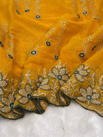 Yellow shimmer chiffon saree with white floral embroidery and green blouse – perfect for haldi and festive wear