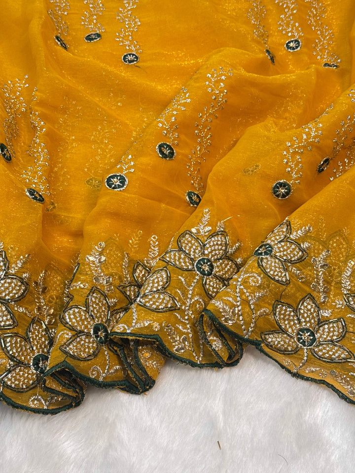 Yellow shimmer chiffon saree with white floral embroidery and green blouse – perfect for haldi and festive wear