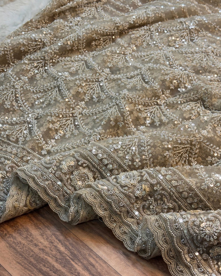 Cream Net Saree with Heavy Cutdana & Sequin Embroidery + Designer Embellished Blouse