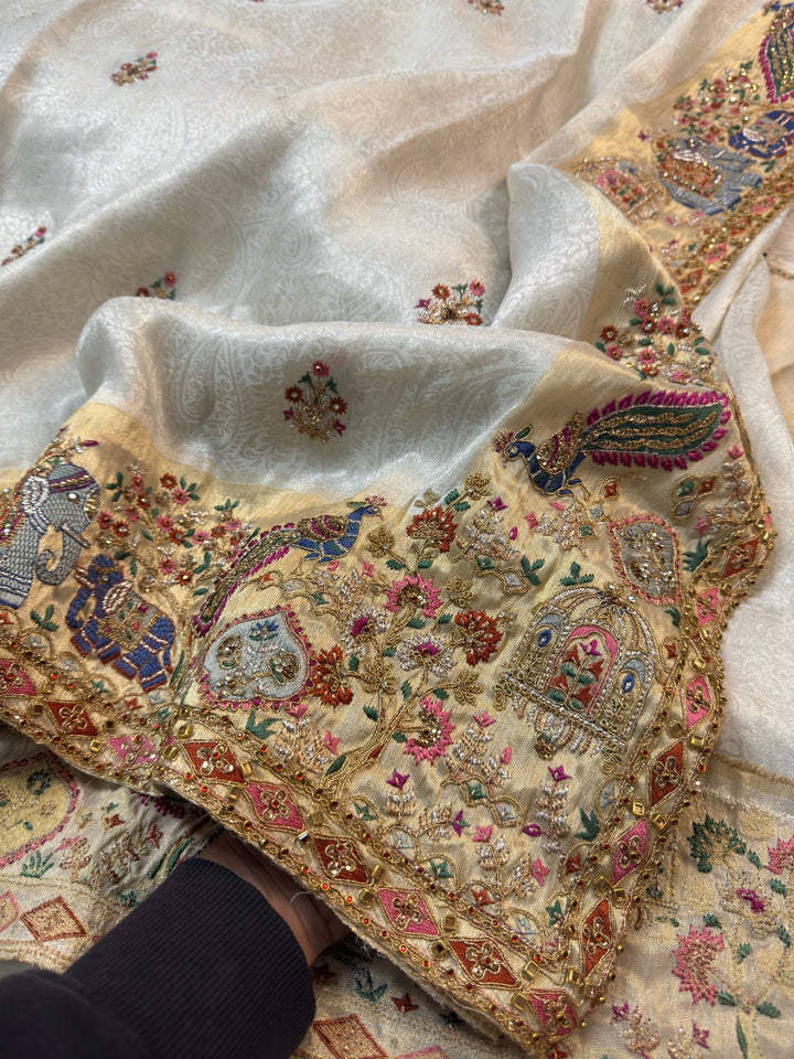 Ivory Jacquard Silk Saree with Royal Peacock & Elephant Embroidered Border (Stitched Blouse)