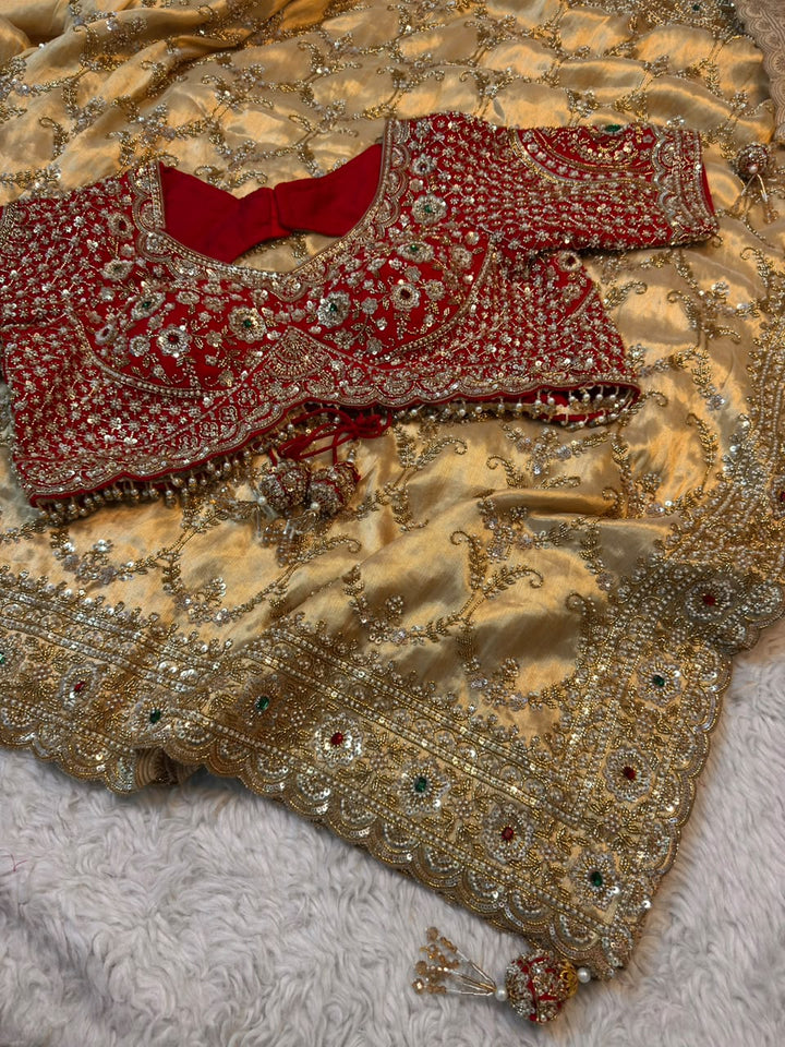 Champagne Gold Heavy Embroidered silk Saree with Red Handwork Blouse