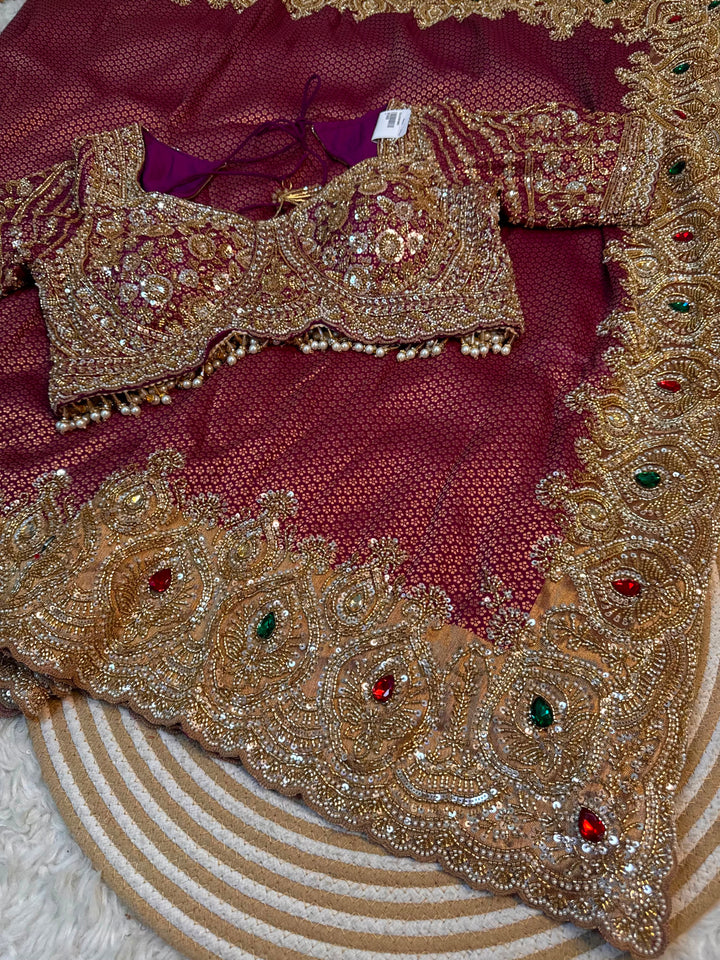 Luxury silk Designer Saree with Heavy Embroidered Gemstone Border