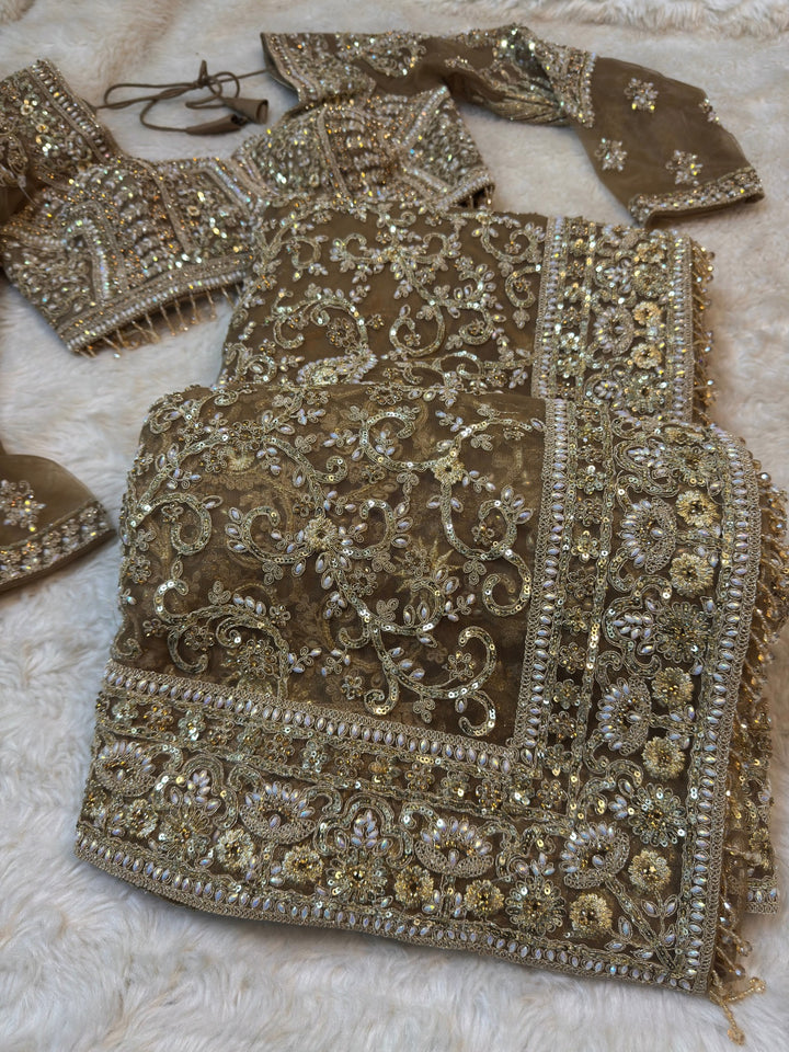 Premium Net Saree with Intricate Hand Embroidery & Stitched Blouse