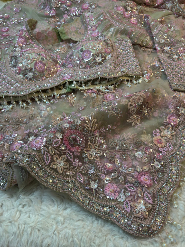 Luxury Pastel Olive Net Saree with Intricate Floral Sequin & Cutdana Work