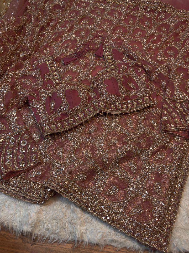 Heavy Embellished Net Saree with Intricate Paisley Sequin Work