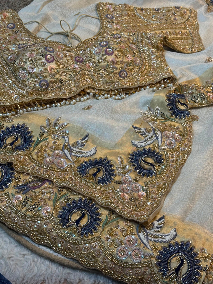 Premium Jacquard Silk Saree with Handcrafted Peacock Embroidered Border & Designer Stitched Blouse